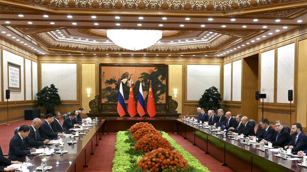 Chinese President Xi Jinping, third left, and Russian President Vladimir Putin, fourth right, attend the talks on the sidelines of the Belt and Road Forum in Beijing - Sputnik India