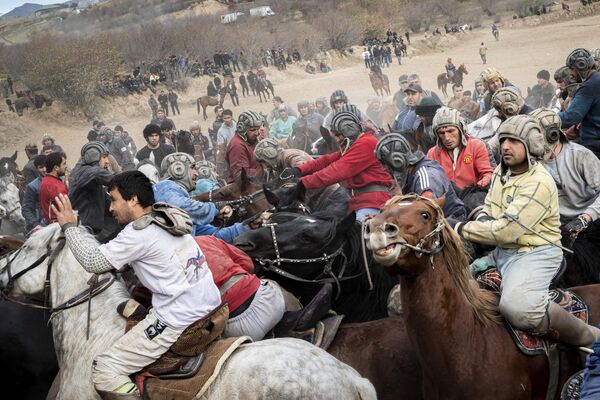 &quot;Buzkashi - the most popular game among Tajiks&quot;, 2nd place, Lambert Colman (France). Sport, series.In early November, one of the first big buzkashi tournaments is taking place near the cement factory in the outskirts of Dushanbe. On this field, ideal for buzkashi, dozens of horse riders gather, hoping to win one of the financial prizes. - Sputnik India