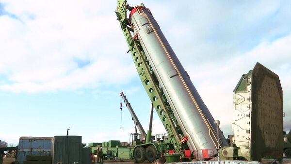 An intercontinental ballistic missile of the Avangard strategic missile system being installed in a silo in the Orenburg region. - Sputnik India