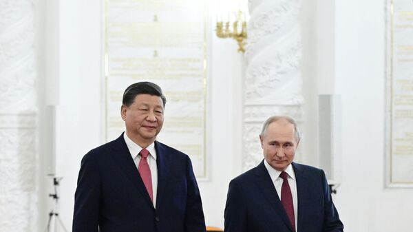 Russian President Vladimir Putin's meeting with Chinese counterpart Xi Jinping in Moscow. File photo - Sputnik India