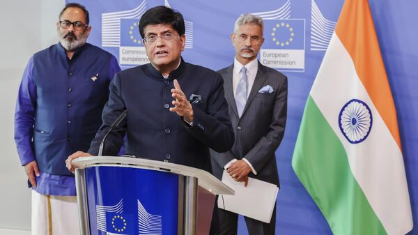 India's Commerce and Industry Minister Piyush Goyal, center, India's Minister for External Affairs S. Jaishankar, right, and India's Minister for State and Skill Development Rajeev Chandrasekhar, left, address the media during a press conference on the EU-India Trade and Technology Council at EU headquarters in Brussels, Belgium, Tuesday, May 16, 2023.  - Sputnik India