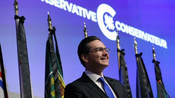 Canadian Conservative Party leader Pierre Poilievre smiles during the National Conservative caucus meeting in Ottawa, Canada on September 12, 2022. - Sputnik India