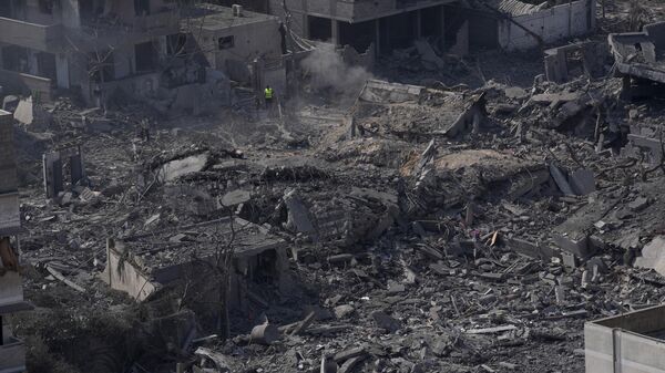Destruction from Israeli aerial bombardment is seen in Gaza City on October 11, 2023. - Sputnik India