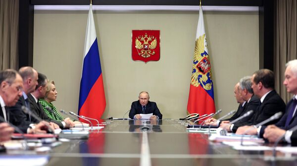 Russian President Vladimir Putin addresses members of Russia's Security Council and security service heads, October 30, 2023. - Sputnik India