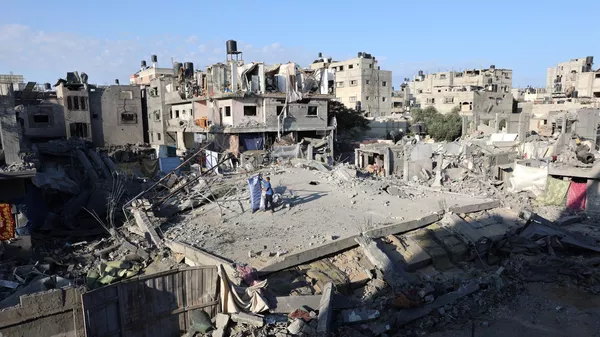 An overview of a destroyed home the day after an Israeli airstrike on the Palestinian Nuseirat refugee camp, in the central Gaza Strip on October 30, 2023. An overview of a destroyed home the day after an Israeli airstrike on the Palestinian Nuseirat refugee camp, in the central Gaza Strip on October 30, 2023. - Sputnik भारत