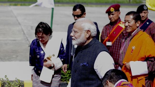 Indian Prime Minister Narendra Modi (C) departs from Paro International airport on August 18, 2019, after his two-day official visit to Bhutan. - Sputnik India