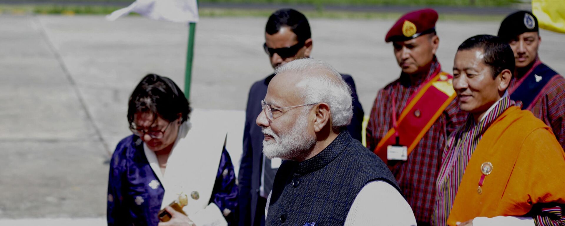 Indian Prime Minister Narendra Modi (C) departs from Paro International airport on August 18, 2019, after his two-day official visit to Bhutan. - Sputnik India, 1920, 07.11.2023