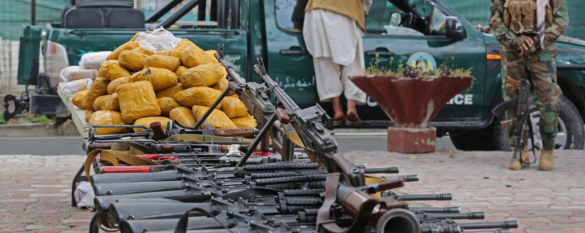 Taliban security personnel display seized weapons and drugs to the media after an operation in Jalalabad on March 2, 2023. - Sputnik India, 1920, 08.11.2023