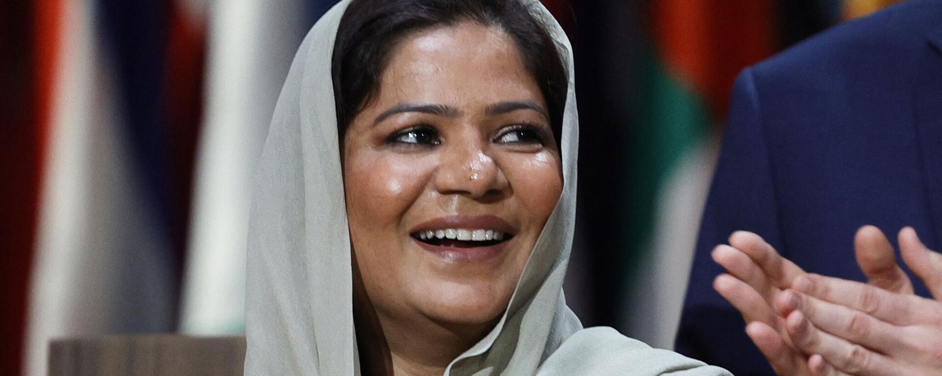 Pakistani teacher Riffat Arif aka Sister Zeph reacts as she is announced the winner of the Varkey Foundation global teacher prize at the UNESCO headquarters in Paris on November 8, 2023. - Sputnik भारत, 1920, 10.11.2023