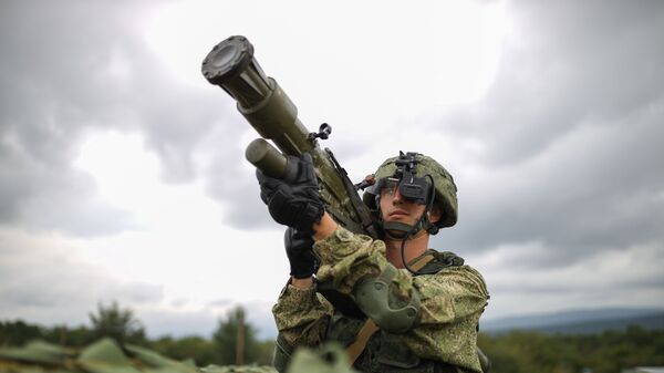 A serviceman with an Igla man-portable anti-aircraft missile system (MANPADS) at demonstration performances in honor of Airborne Forces Day at the Raevsky training ground in Krasnodar. - Sputnik India