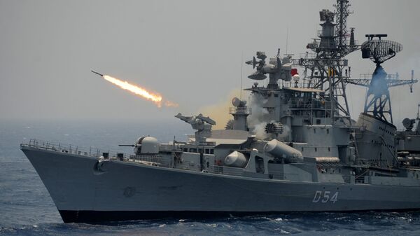 A rocket is fired from the Indian Navy destroyer ship INS Ranvir during an exercise drill in the Bay Of Bengal off the coast of Chennai on April 18, 2017 - Sputnik भारत