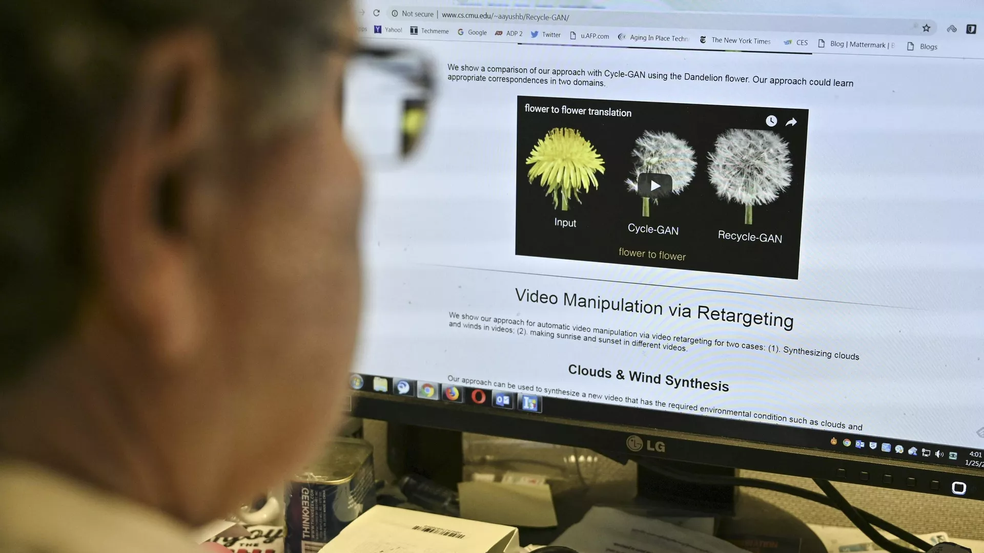 An AFP journalist views an example of a deepfake video manipulated using artificial intelligence, by Carnegie Mellon University researchers, from his desk in Washington, DC January 25, 2019.
