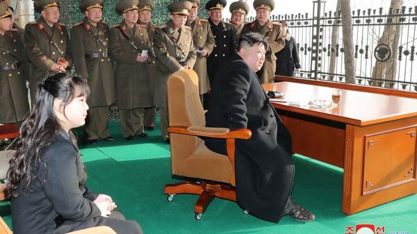 DPRK leader Kim Jong Un, KPA brass, and Kim's daughter watch a rocket artillery drill in Nampo on March 9, 2023. - Sputnik भारत