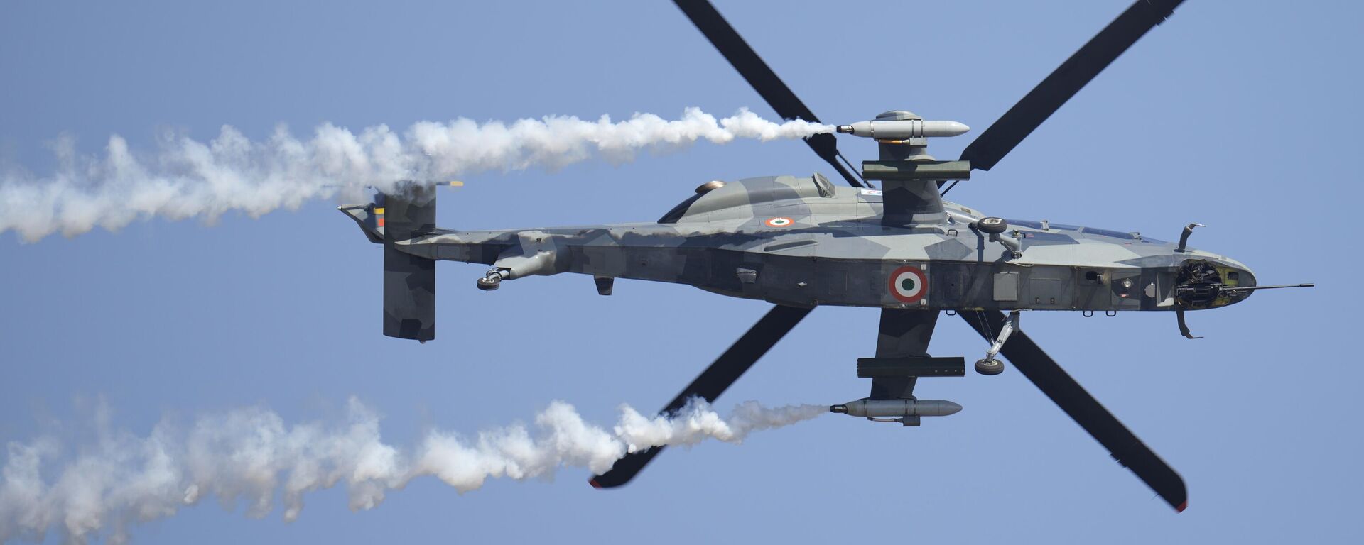 India's indigenous light combat helicopter Prachand performs aerobatic maneuvers during the inauguration of the Aero India 2023 at Yelahanka air base in Bengaluru, India, Monday, Feb. 13, 2023. - Sputnik India, 1920, 04.12.2023