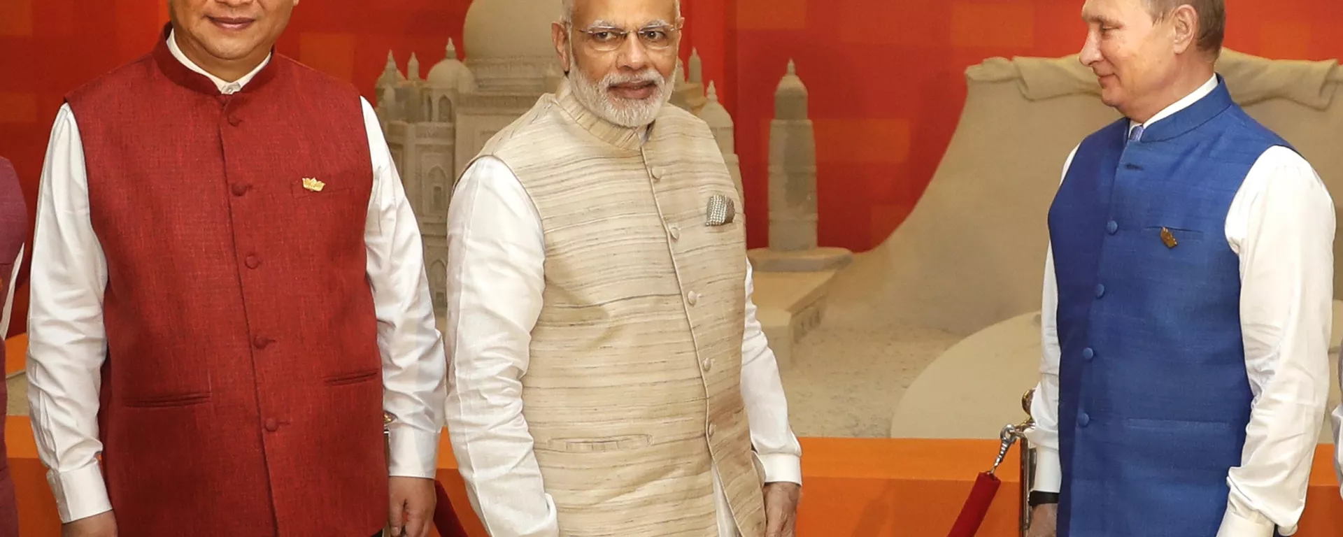 Indian Prime Minister Narendra Modi, center, Russian President Vladimir Putin, right, and Chinese President Xi Jinping stand for photographs prior to dinner hosted by Modi for leaders of BRICS nations in Goa, India, Oct.15, 2016 - Sputnik India, 1920, 15.02.2024