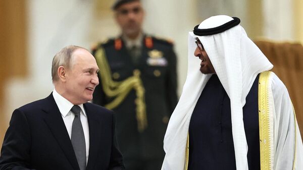 Russian President Vladimir Putin and President of the United Arab Emirates Sheikh Mohamed bin Zayed Al Nahyan arrive for a welcoming ceremony before a meeting at Qasr Al Watan Palace in Abu Dhabi, United Arab Emirates. - Sputnik India