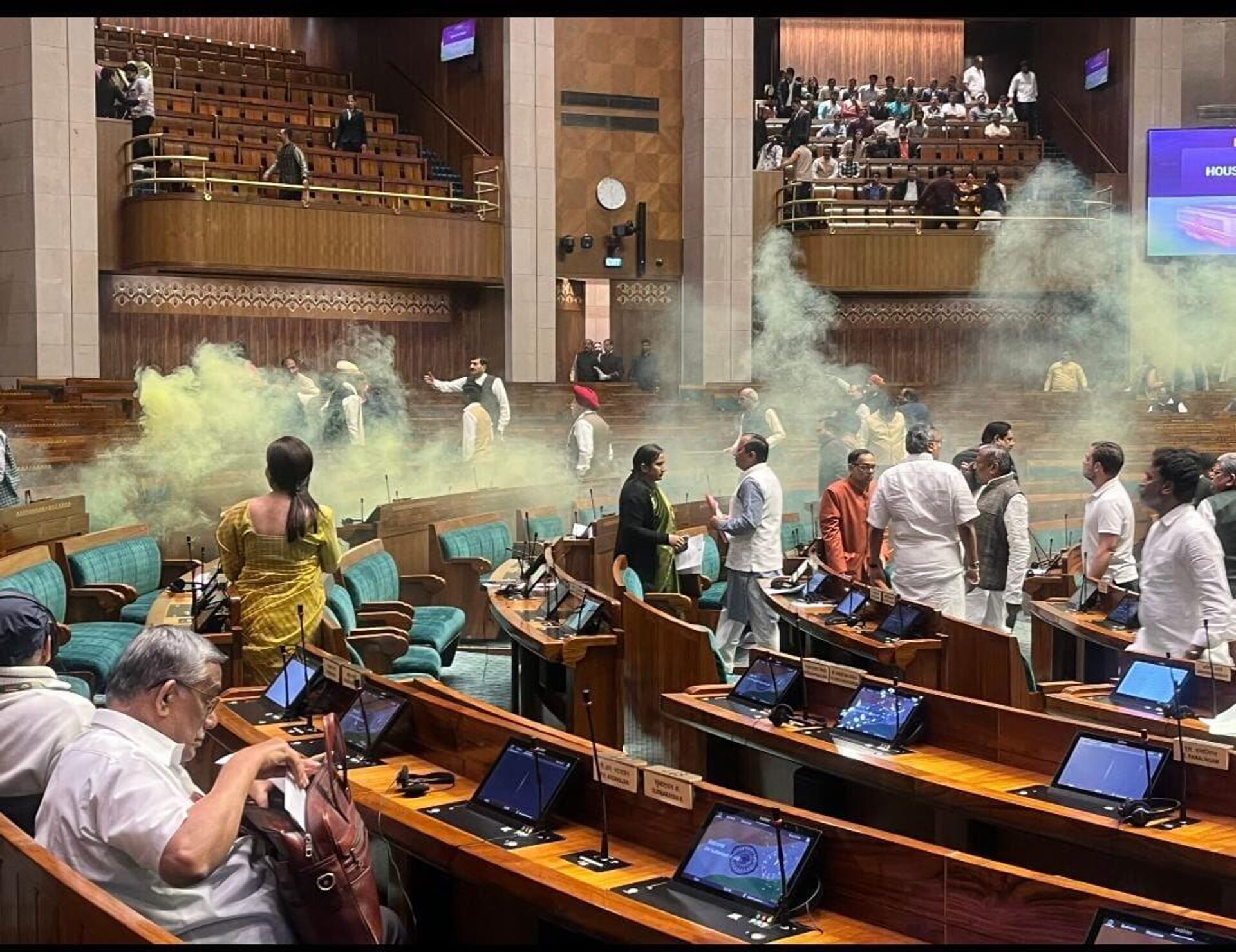 Picture from inside the Lok Sabha where yellow gas canister was unleashed by the unidentified young men - Sputnik India, 1920, 21.12.2023