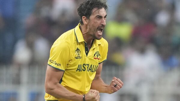 Australia's Mitchell Starc celebrate the wicket of South Africa - Sputnik India