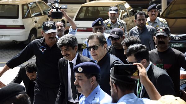 Pakistan's former Prime Minister Imran Khan, center, arrives to appear at a Supreme Court in Islamabad, Pakistan, Monday, July 24, 2023. - Sputnik India