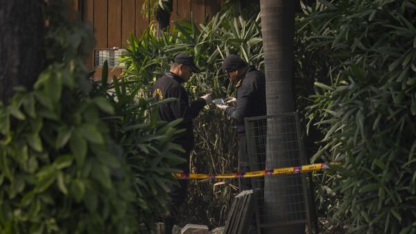Members of the forensic team of the elite National Security Guard inspect the perimeter of the Israeli Embassy in New Delhi, India, Wednesday, Dec. 27, 2023. - Sputnik भारत