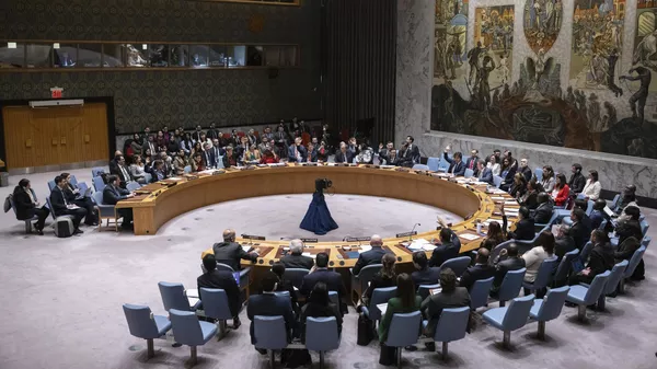 Representatives of member countries take vote during the Security Council meeting at United Nations headquarters, Friday, Dec. 22, 2023. - Sputnik भारत