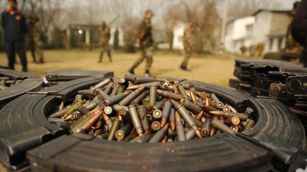 Indian army soldiers display before the media arms and ammunition they claim to have seized from insurgents in Srinagar, India, Sunday, Dec. 7, 2014. - Sputnik भारत