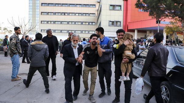 Families of victims of the explosions gather at the courtyard of a hospital in the city of Kerman, about 510 miles (820 kilometres) southeast of the capital Tehran, Iran, Wednesday, Jan. 3, 2024. - Sputnik India