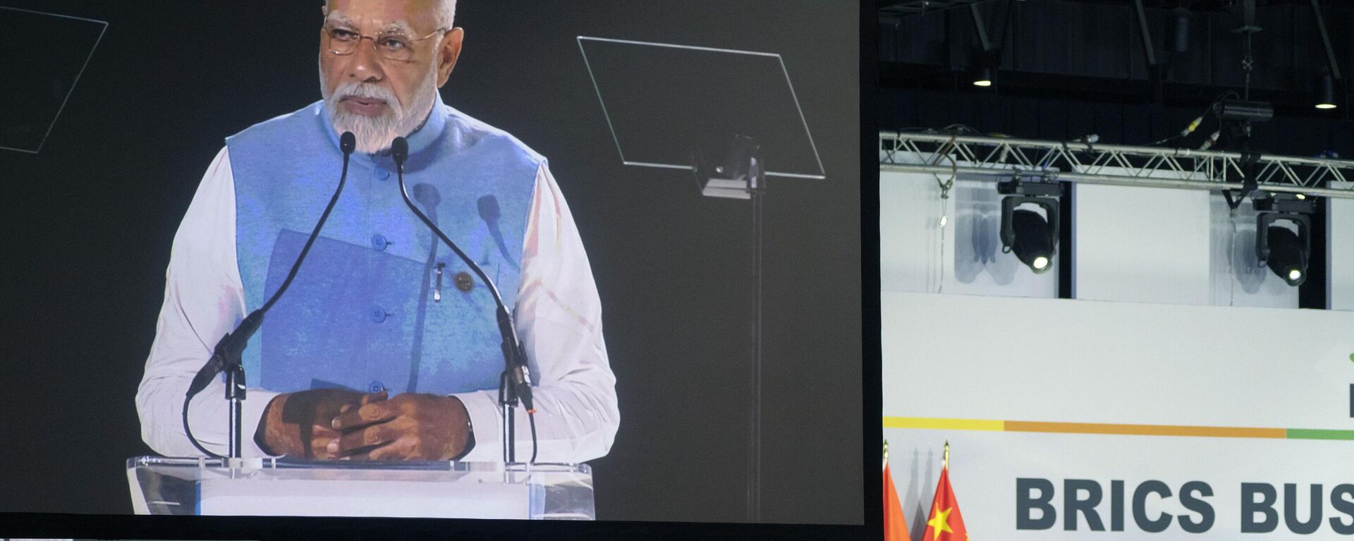 Indian Prime Minister Narendra Modi addresses leaders from the BRICS group of emerging economies at the start of a three-day summit in Johannesburg, South Africa, Tuesday, Aug. 22, 2023. - Sputnik भारत, 1920, 06.01.2024