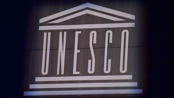 This photograph shows the logo of UNESCO during the 75th anniversary celebrations of The United Nations Educational, Scientific and Cultural Organization (UNESCO) at UNESCO headquarters in Paris on November 12, 2021. - Sputnik भारत