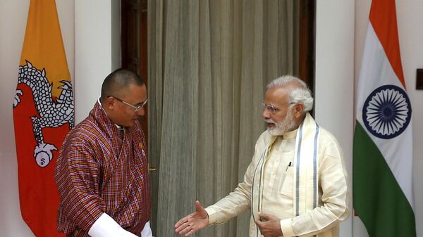Indian Prime Minister Narendra Modi, right, prepares to shake hand with his Bhutan counterpart Tshering Tobgay in New Delhi, India, Friday, July 6, 2018.  - Sputnik India
