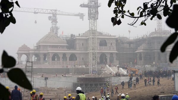A construction crew works on Ram Mandir, a Hindu temple dedicated to Lord Ram, being built at the site of the demolished Babri Masjid mosque in Ayodhya, India, Friday, Dec. 29, 2023. - Sputnik India
