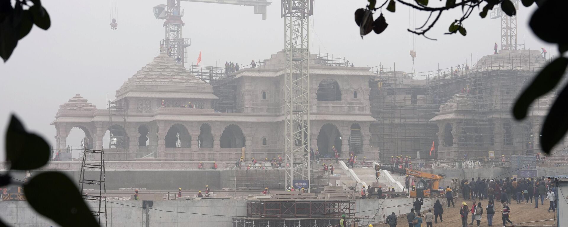 A construction crew works on Ram Mandir, a Hindu temple dedicated to Lord Ram, being built at the site of the demolished Babri Masjid mosque in Ayodhya, India, Friday, Dec. 29, 2023. - Sputnik India, 1920, 15.01.2024