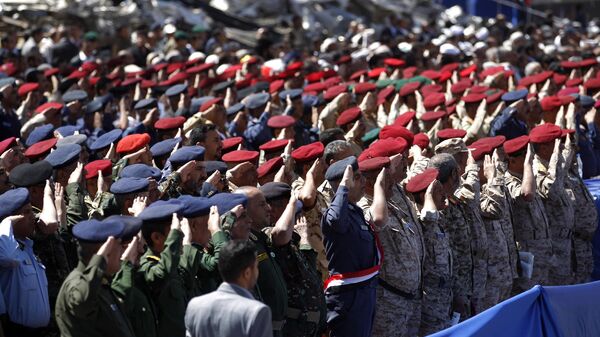 Army officers allied with the Houthis attend a rally to mark three years of war on the country, in the capital Sanaa on March 26, 2018.  - Sputnik भारत