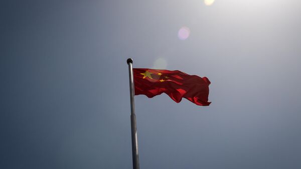 The Chinese national flag is seen at the entrance to the Zhongnanhai leadership compound in Beijing - Sputnik India