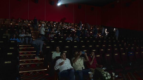Members of the media and other guests watch a movies during the inauguration of Kashmir's first multiplex cinema in Srinagar, Indian controlled Kashmir, Tuesday, Sept. 20, 2022.  - Sputnik भारत
