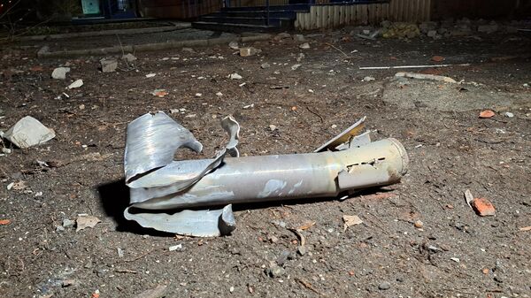 A fragment of a shell lies on the ground in Donetsk after a recent shelling from Ukrainian troops - Sputnik India