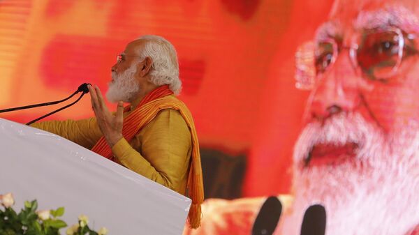 Indian Prime Minister Narendra Modi addresses a gathering during the groundbreaking ceremony of a temple dedicated to the Hindu god Ram, in Ayodhya, India, Wednesday, Aug. 5, 2020.  - Sputnik भारत