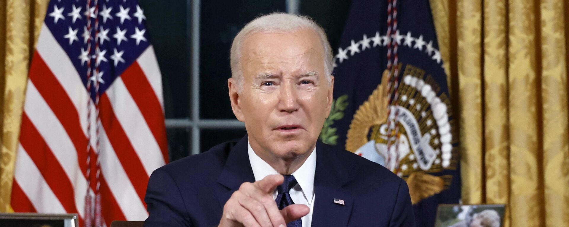 US President Joe Biden addresses the nation on the conflict between Israel and Gaza and the Russian invasion of Ukraine from the Oval Office of the White House in Washington, DC, on October 19, 2023 - Sputnik भारत, 1920, 02.02.2024