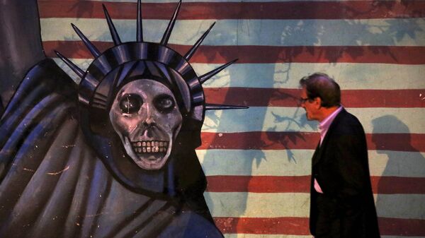 Satirized painting of the Statue of Liberty painted on the wall of the former U.S. Embassy, in Tehran, Iran - Sputnik India
