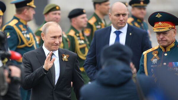 Президент РФ Владимир Путин на Параде Победы на Красной площади - Sputnik India