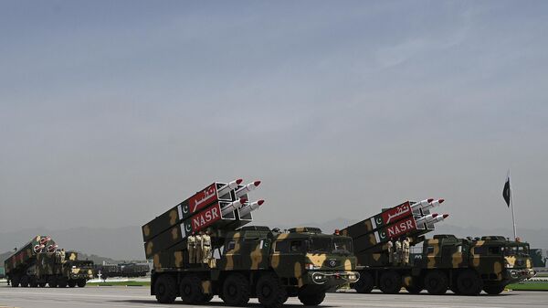 Pakistan's military vehicles carrying missiles Nasr (R) and Babur (L) take part in a military parade to mark Pakistan's National Day in Islamabad on March 25, 2021. - Sputnik India