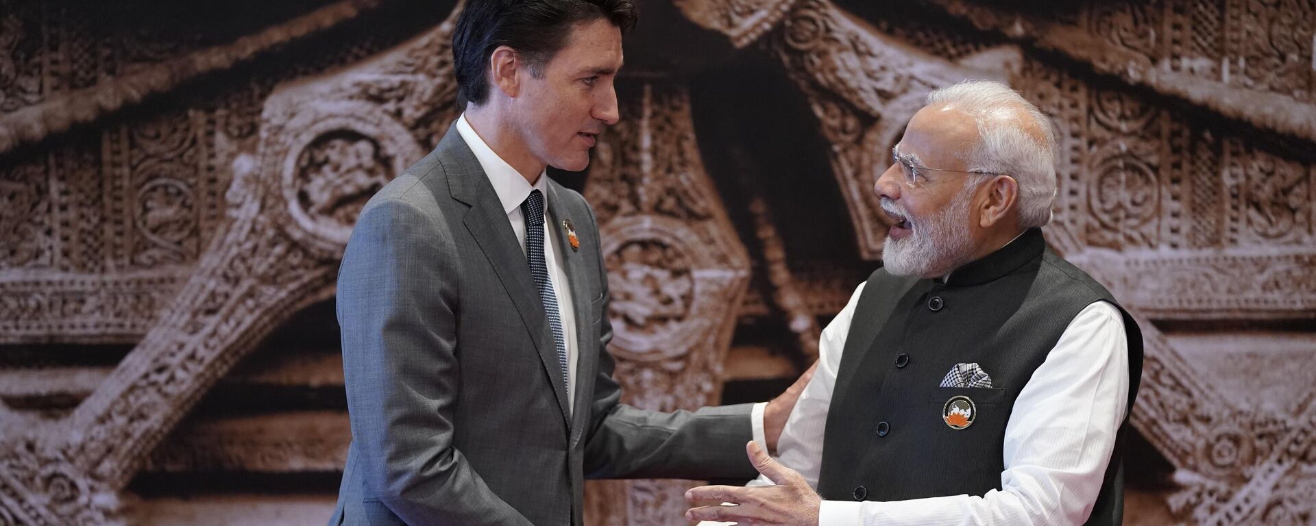 Indian Prime Minister Narendra Modi welcomes Canada Prime Minister Justin Trudeau upon his arrival at Bharat Mandapam convention center for the G20 Summit, in New Delhi, India, Saturday, Sept. 9, 2023. - Sputnik India, 1920, 25.01.2024