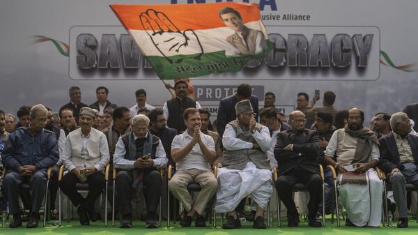 Congress party leader Rahul Gandhi, center, gestures as he joins other leaders from the opposition INDIA alliance during a protest rally against the suspension of more than 140 lawmakers from the parliament, in New Delhi, India, Friday, Dec. 22, 2023. - Sputnik India