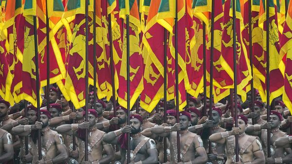 Sri Lankan soldiers march during the 76th Independence Day commemoration ceremony of Sri Lanka in Colombo, Sri Lanka, Sunday, Feb. 4, 2024. - Sputnik India