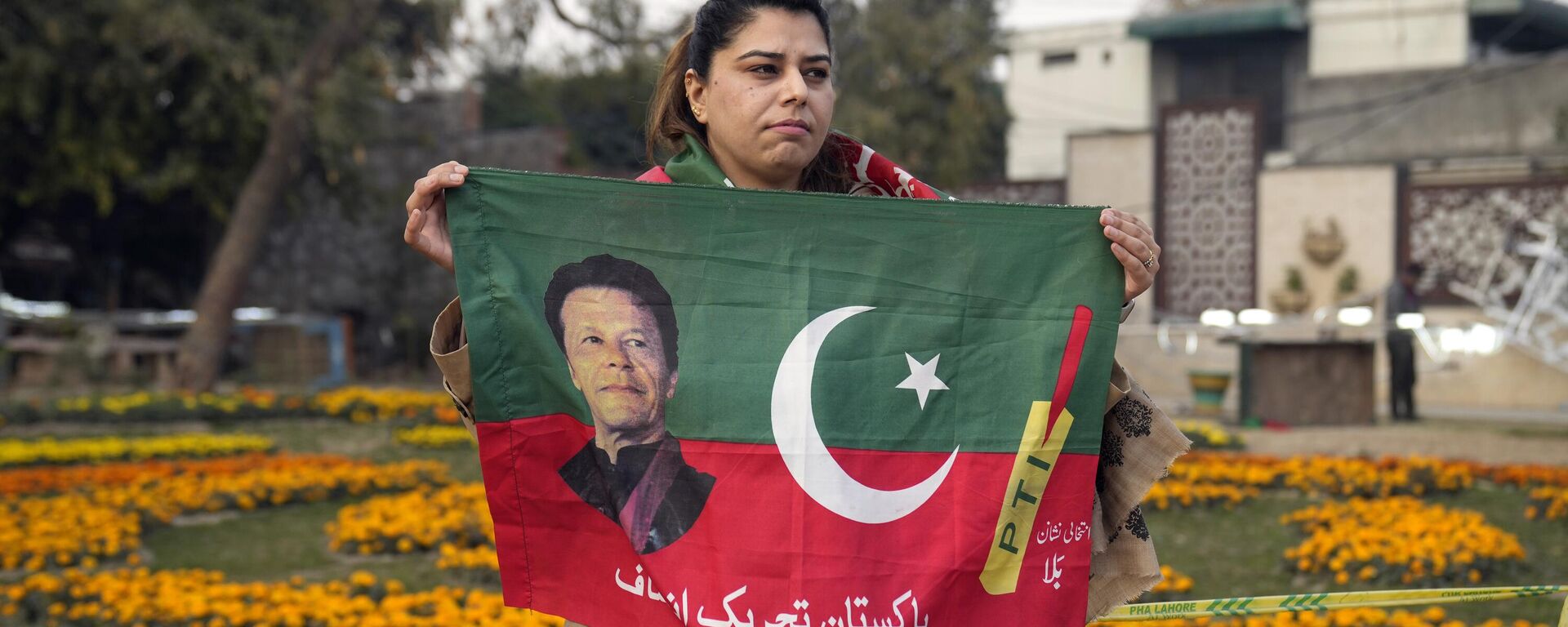 Supporter of former prime minister Imran Khan and political party Pakistan Tehreek-e-Insaf (PTI) attend during an election campaign rally in Lahore, Pakistan, Sunday, Jan. 28, 2024. - Sputnik India, 1920, 26.03.2024