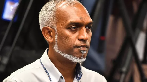 People's National Congress (PNC) candidate Mohamed Muizzu looks on during a press conference in Male, on September 30, 2023.  - Sputnik भारत