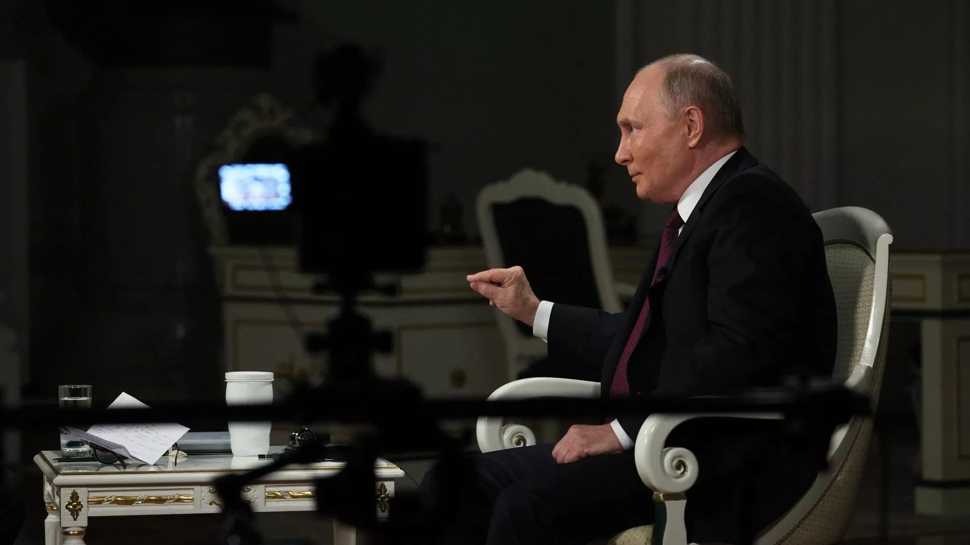 Russian President Vladimir Putin speaks during an interview with US journalist Tucker Carlson at the Kremlin in Moscow, Russia.