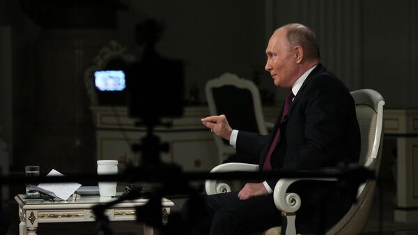 Russian President Vladimir Putin speaks during an interview with US journalist Tucker Carlson at the Kremlin in Moscow, Russia. - Sputnik भारत