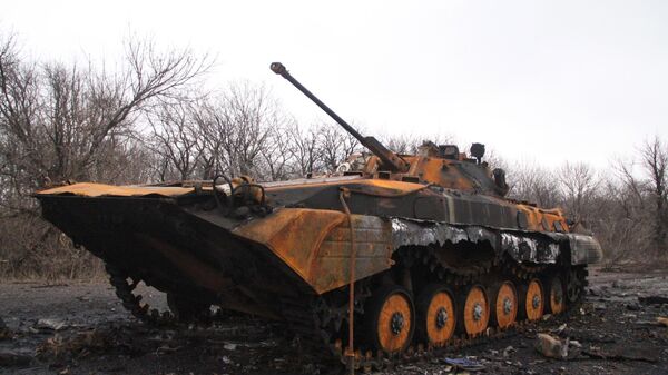 Burned Ukrainian military vehicle on the road from Uglegorsk to Debaltsevo, Donetsk People's Republic, February 6, 2015. - Sputnik भारत