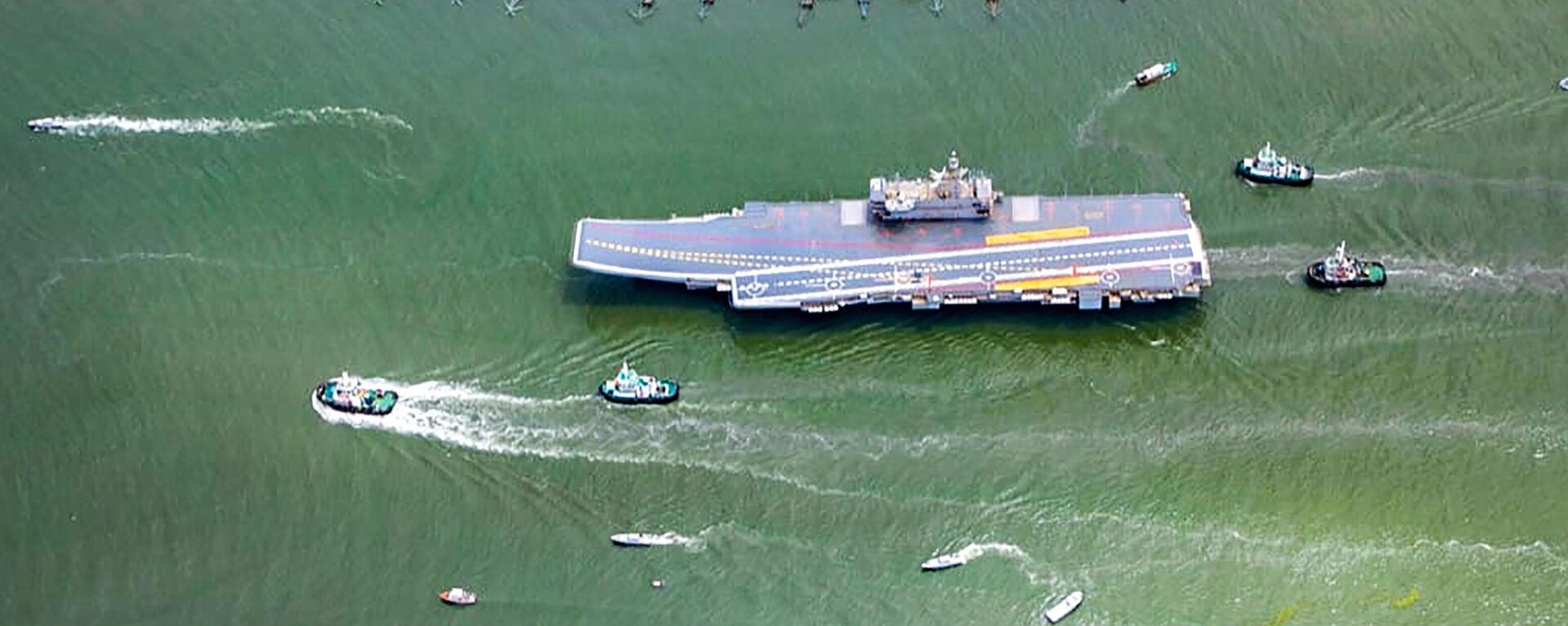 In this handout picture provided by the Indian Navy, INS Vikrant, India's first indigenously-built aircraft carrier, sails for sea trials from Kochi, India, Thursday, Aug. 25, 2022. - Sputnik भारत, 1920, 14.02.2024